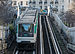 Paris Metro Line 6 train northeast of Pasteur station 140207 5.jpg